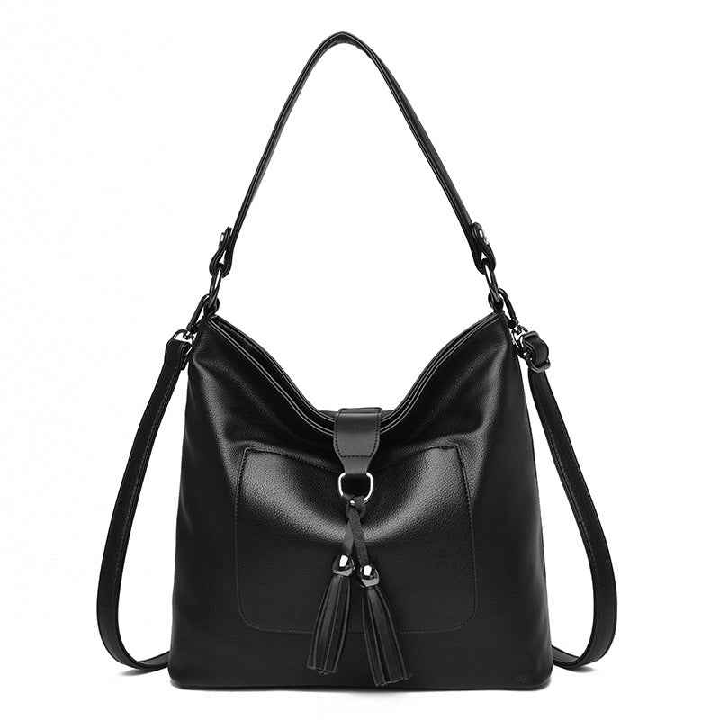 Large women hobo bag with tassel decoration and detachable long strap in pu leather